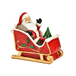 PERE NOEL EN TRAINEAU ROUGE 14X13X8CM