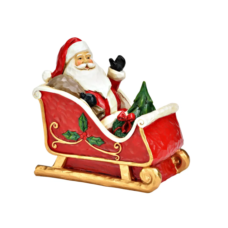 PERE NOEL EN TRAINEAU ROUGE 14X13X8CM